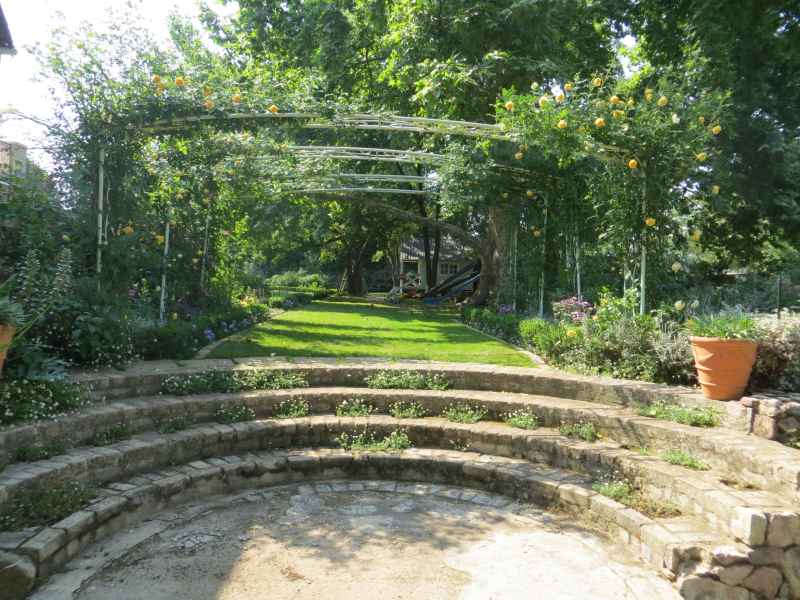 Circular steps going up to garden