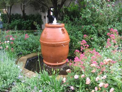 Garden design by Shirley Wallington — Using a lovely terracotta pot for a water feature